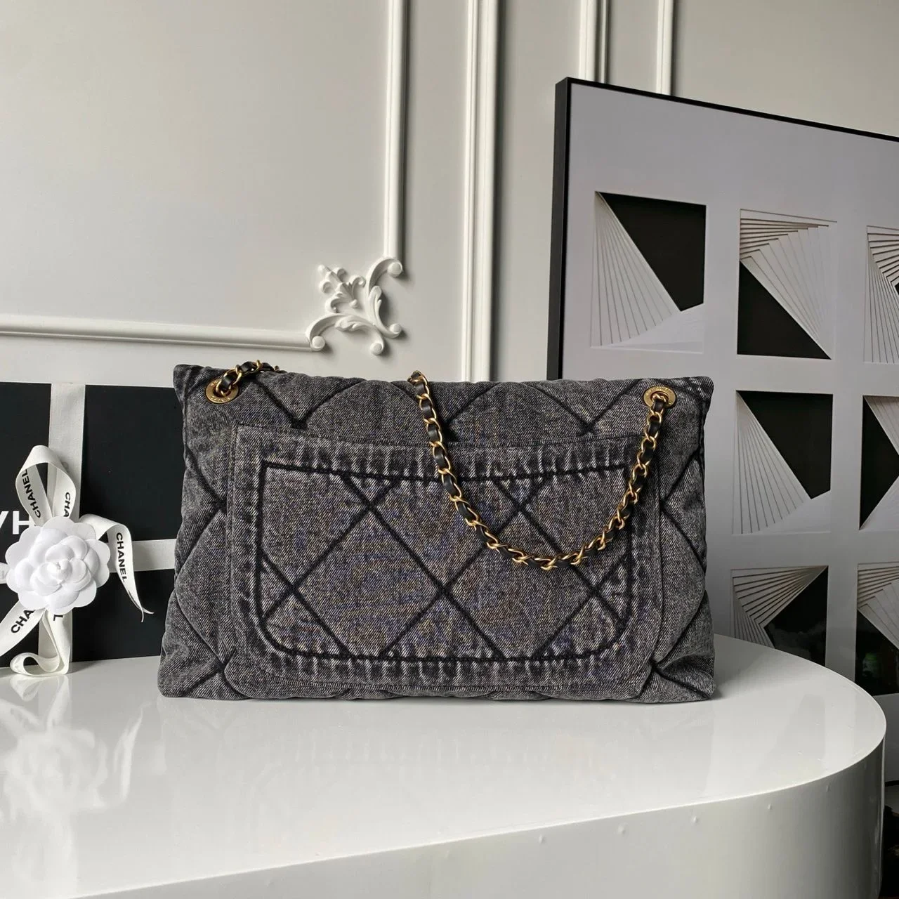 Chanel Maxi Flapbag in washed denim with gold-tone metal hardware Bag product view 3