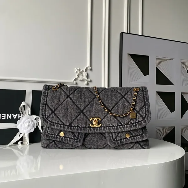 Chanel Maxi Flapbag in washed denim with gold-tone metal hardware Bag product photo