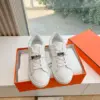Hermès Women White Low-Top Sneakers — Silver-Tone Buckle Detail product view 3