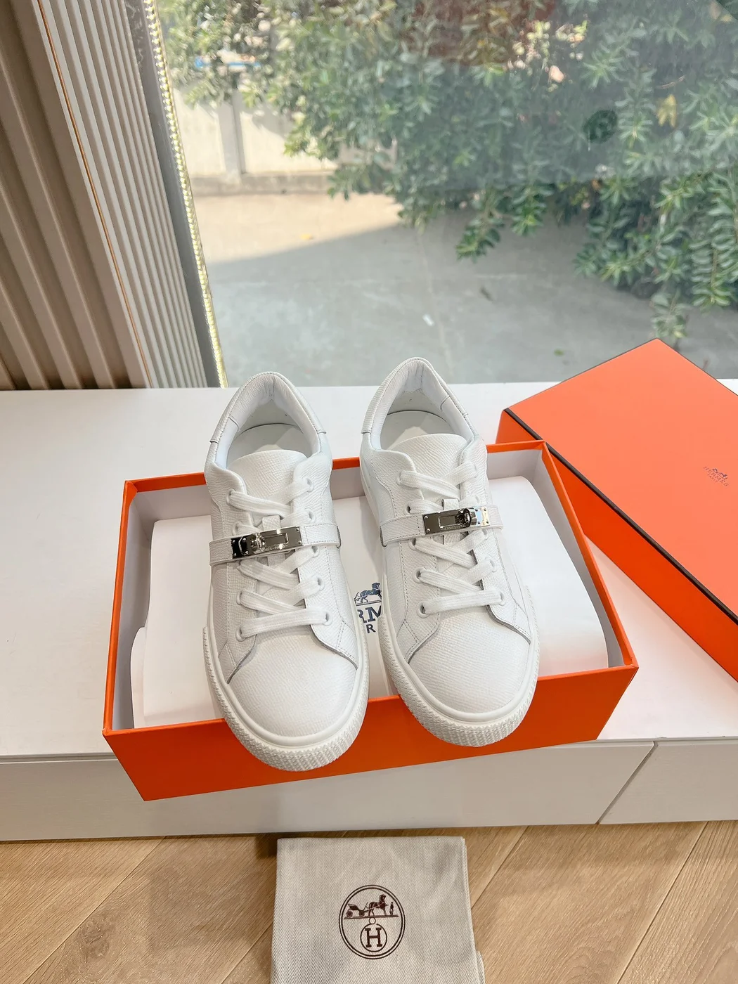 Hermès Women White Low-Top Sneakers — Silver-Tone Buckle Detail product view 3