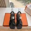 Hermès Women Black Leather Strappy Sandals — Buckle-Detail T-Strap product view 1