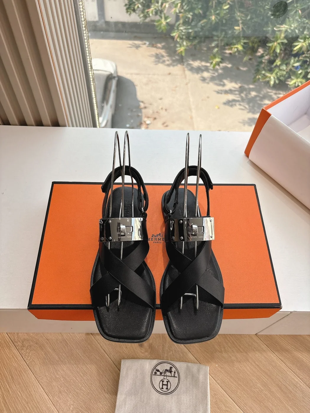 Hermès Women Black Leather Strappy Sandals — Buckle-Detail T-Strap product view 1