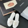 Chanel Women White Quilted Leather Slides — Chain-Woven CC Detail product view 1