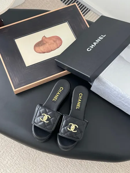 Chanel Women Black Quilted Leather Slides — Gold-Tone CC Detail product photo