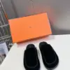 Hermès Women Black Suede Slippers product view 1