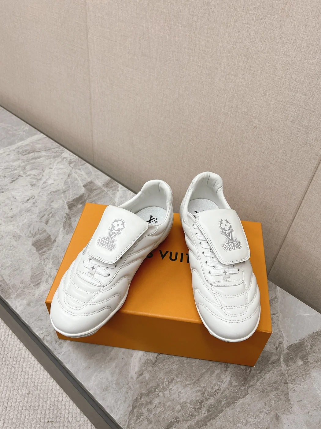 Louis Vuitton Women White Leather Sneakers — Outlined LV Side Detail product view 3