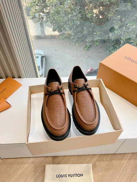 Louis Vuitton Women Brown Textured Leather Loafers product photo