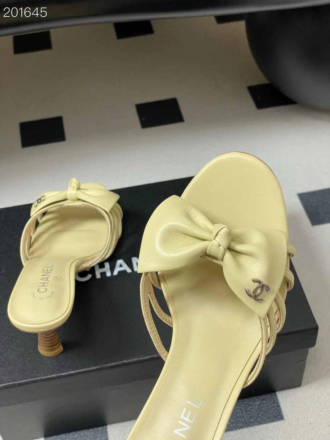 Chanel light-colored strappy bow spool heels product view 1