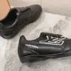 Louis Vuitton Women Black Leather Sneakers — Outlined LV Side Detail product view 2