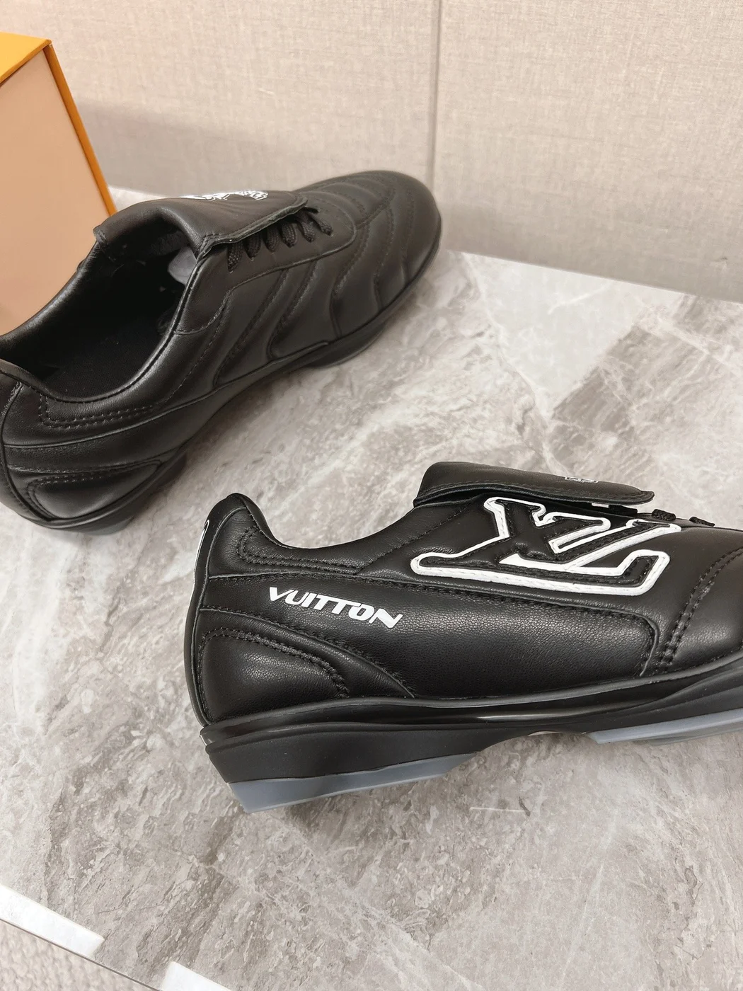 Louis Vuitton Women Black Leather Sneakers — Outlined LV Side Detail product view 2