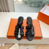 Hermès Women Black Leather Studded Mules product view 1