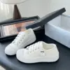 Chanel Women White Canvas Sneakers product view 2
