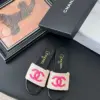 Chanel Women Black Leather And Beige Fabric Slides product view 1