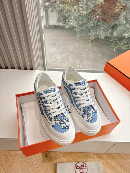 Hermès Women Light Blue Canvas And White Sneakers product photo