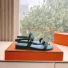 Hermès Women Black Leather Sandals — Two-Strap Metal-Bar Detail product view 2