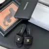 Chanel Women Black Woven Leather Slides product view 1