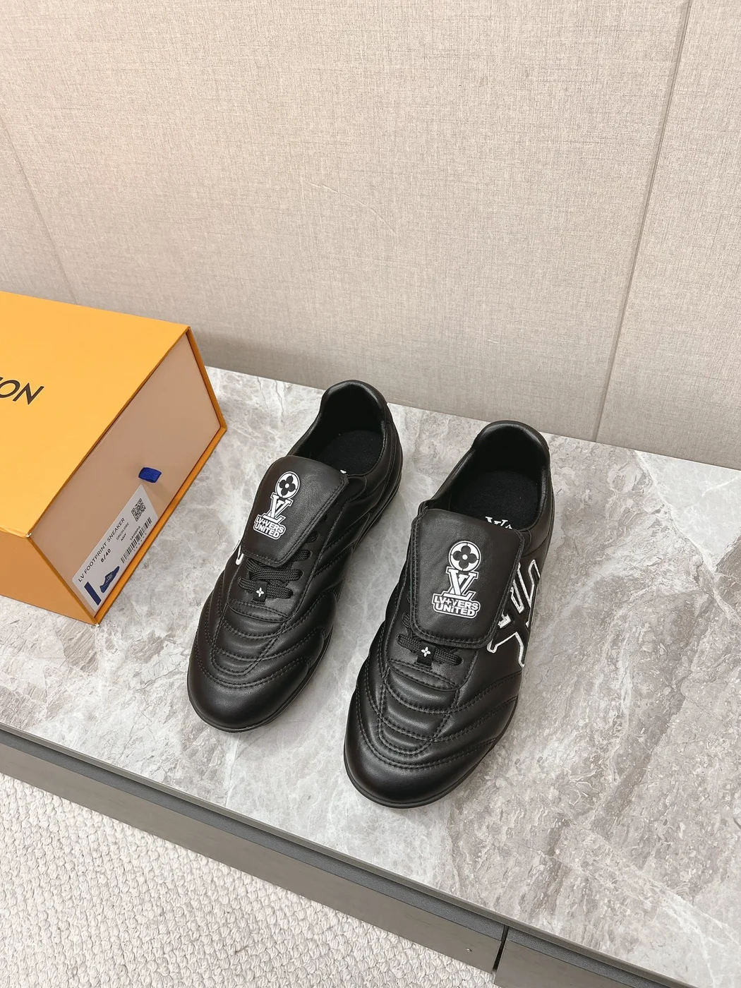 Louis Vuitton Women Black Leather Sneakers — Outlined LV Side Detail product view 5