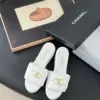 Chanel Women White Quilted Leather Slides — Gold-Tone CC Detail product view 1