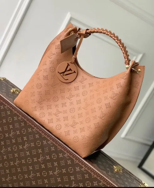 Louis Vuitton Carmel Mahina Leather Hobo Bag in Cognac product photo