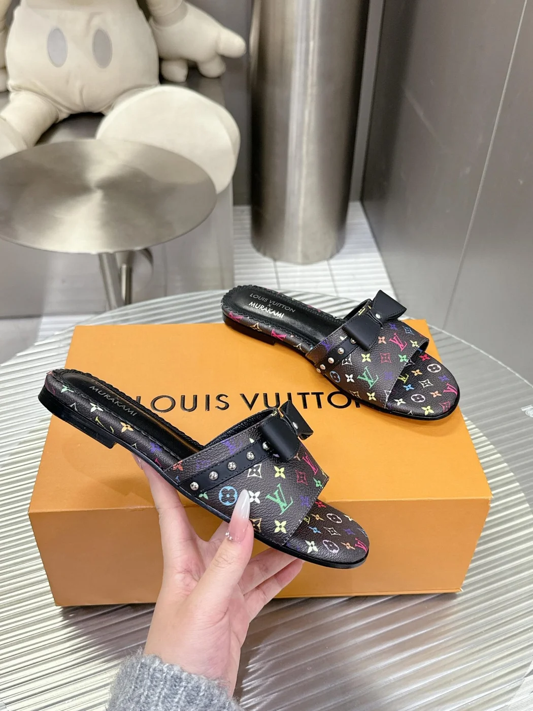 Louis Vuitton Women Black Patterned Leather Bow Slide Sandals product view 6
