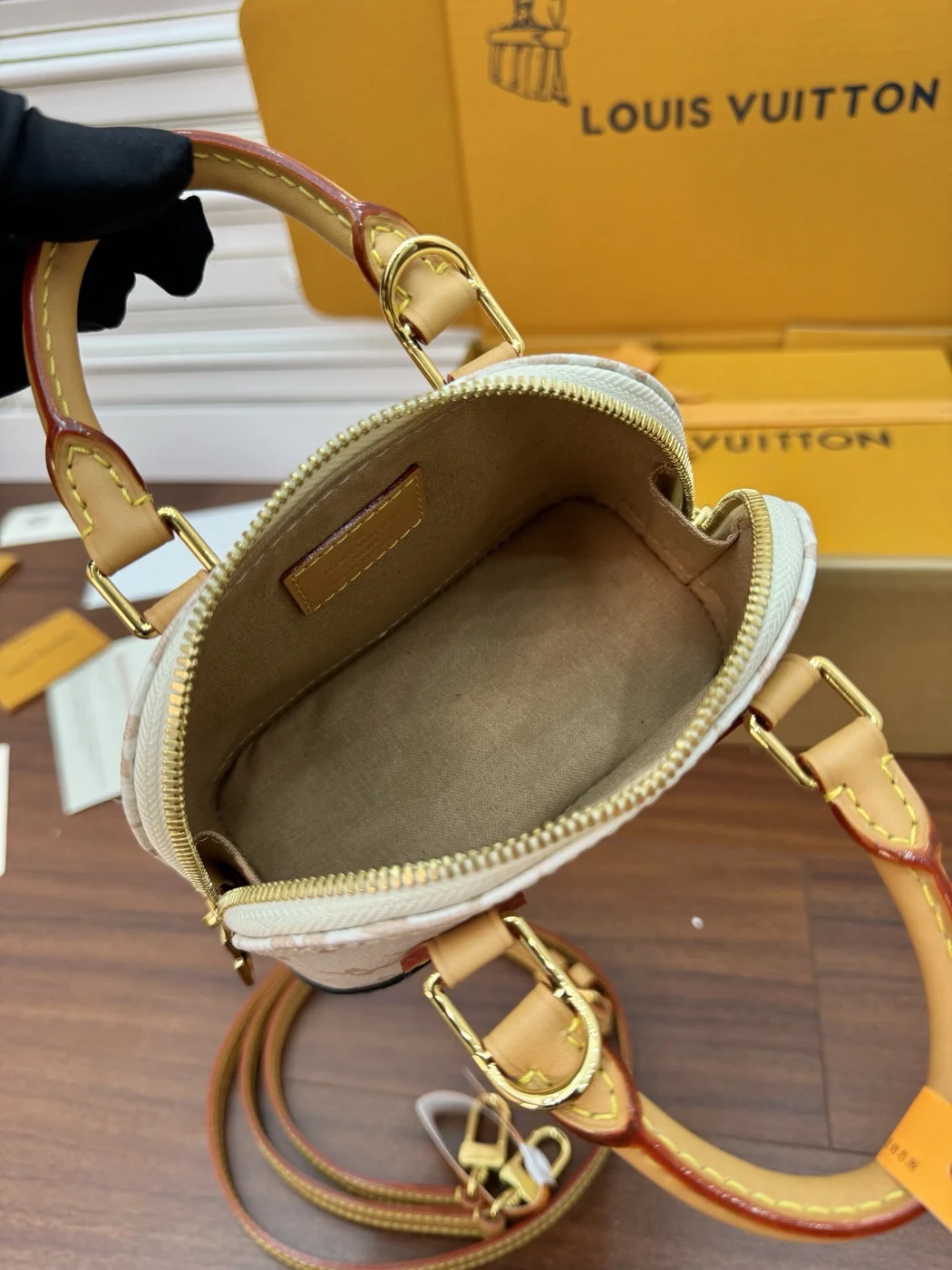 Louis Vuitton Nano Alma handbag in Monogram Dune canvas product view 4
