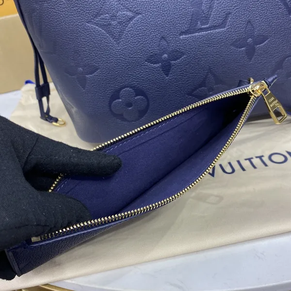 Louis Vuitton Neverfull MM Monogram Empreinte Leather Bag product view 4