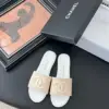 Chanel Women Woven-Fabric Slides — Beige with White Flat Sole product view 1