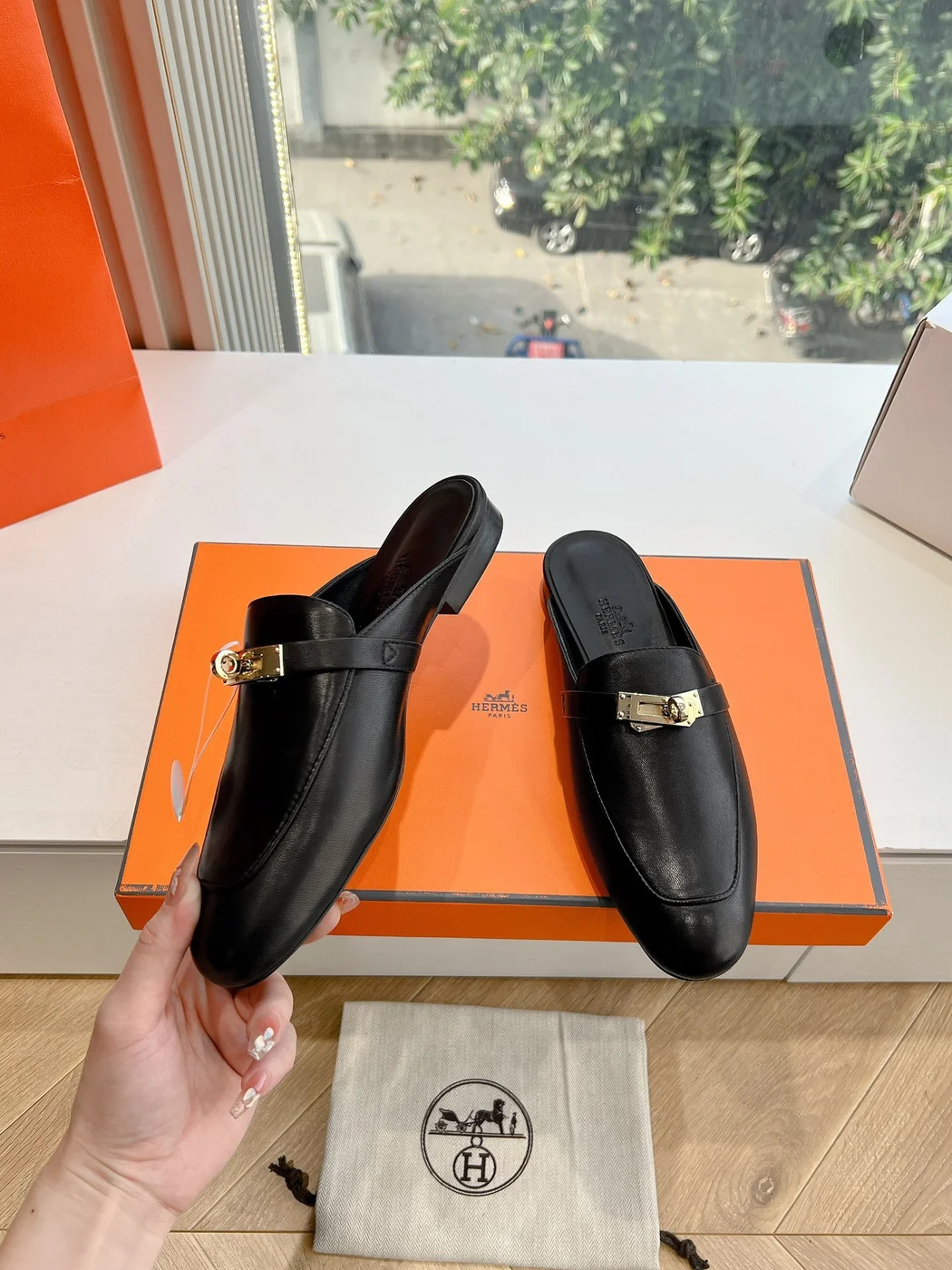 Hermès Women Black Leather Mules — Metal-Bar Loafer Style product view 6