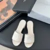 Chanel Women Ivory Quilted Leather Mules — Tonal CC Detail product view 1