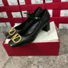 Valentino Women Black Mary Jane Heels with Gold-Tone VLogo Detail product view 2