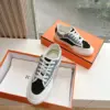 Hermès Women Black Blue Canvas And Leather Sneakers product view 3