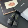 Chanel Women Black Leather Quilted Slides — Chain-Woven CC Detail product view 1