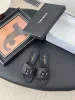 Chanel Women Black Quilted Fabric Slides — Tonal CC Detail product view 1