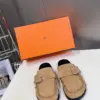 Hermès Women Suede Buckle Mules — Tan Brown product view 1