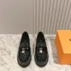 Louis Vuitton Women Black Patent Leather Loafers — Tonal Patterned Upper product view 1