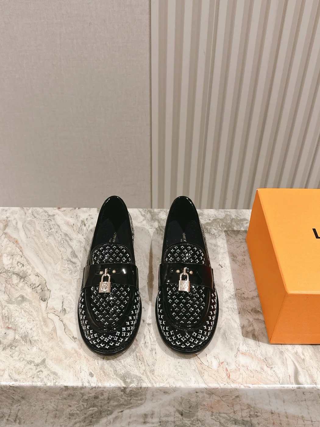 Louis Vuitton Women Black Patent Leather Loafers — Tonal Patterned Upper product view 1