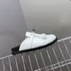 Hermès Women White Leather Mules — Rounded Toe with Black Sole product view 2