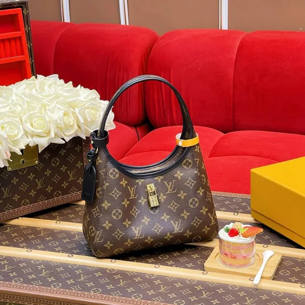 Louis Vuitton The Drop PM Handbag in Monogram Coated Canvas product photo