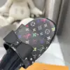 Louis Vuitton Women Black Patterned Leather Bow Slide Sandals product view 2