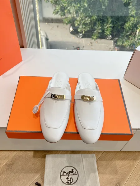 Hermès Women White Leather Mules — Metal-Bar Loafer Style product photo