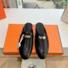 Hermès Women Black Leather Mules — Metal-Bar Loafer Style product view 1