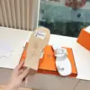 Hermès Women White Leather Flat Sandals product view 2