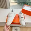 Hermès Women White Low-Top Sneakers — Silver-Tone Buckle Detail product view 6