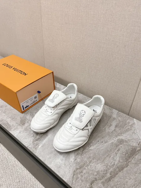 Louis Vuitton Women White Leather Sneakers — Outlined LV Side Detail product photo
