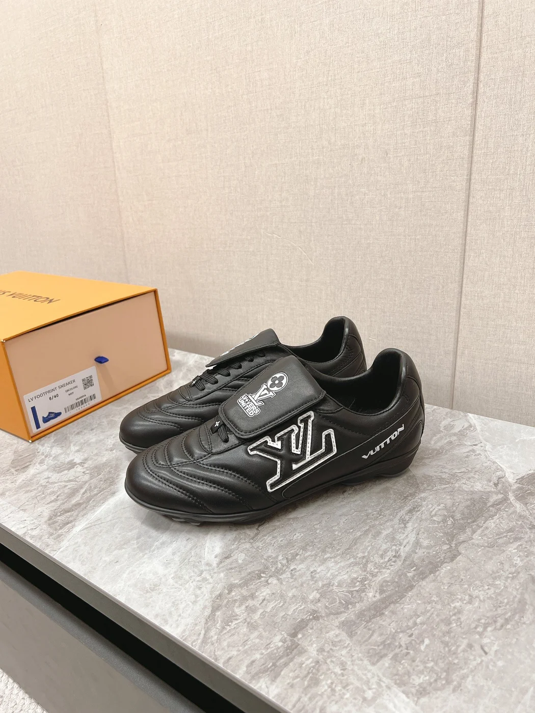 Louis Vuitton Women Black Leather Sneakers — Outlined LV Side Detail product view 4