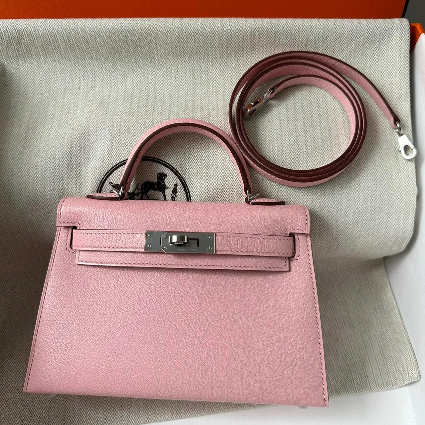 Hermès Mini Kelly 20 bag in Rose Sakura leather with silver hardware product view 1