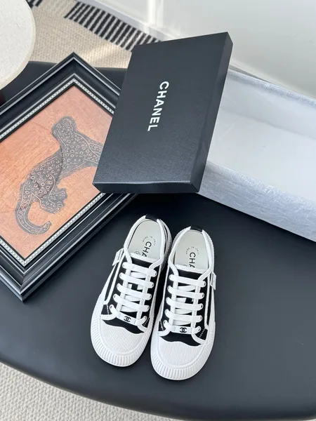 Chanel Women Black Canvas White Trim Sneakers product photo