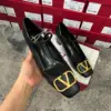 Valentino Women Black Mary Jane Heels with Gold-Tone VLogo Detail product view 1
