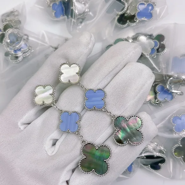 Van Cleef & Arpels Alhambra White Blue and Black Three-Motif Silver-Tone Drop Earrings product view 7
