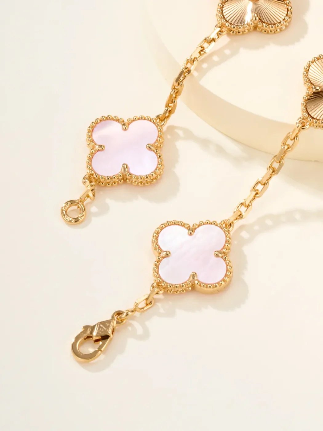 Van Cleef & Arpels Alhambra Pale Pink Clover and Gold-Tone Knot Bracelet product view 8